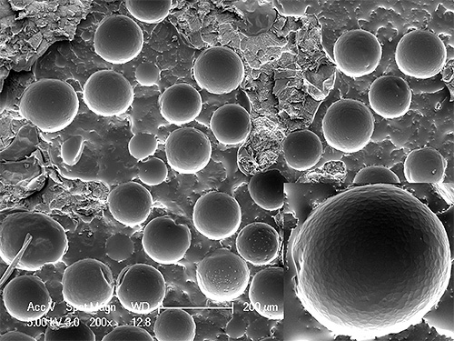 Microcapsules sur la photo à fort grossissement Microcapsules sur la photo à fort grossissement
